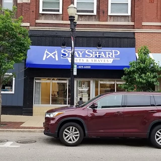 Exterior Storefront Awnings for Stay Sharp Cuts & Shaves in Elgin, IL